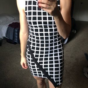 Asymmetrical body con black and white dress